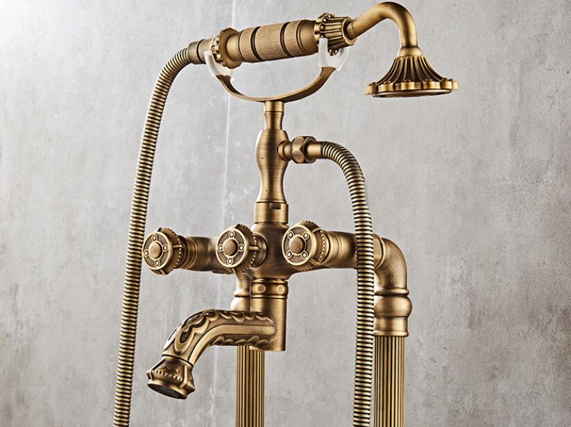 Juno Antique Brass Outdoor Floor Standing Faucet with Handheld Shower