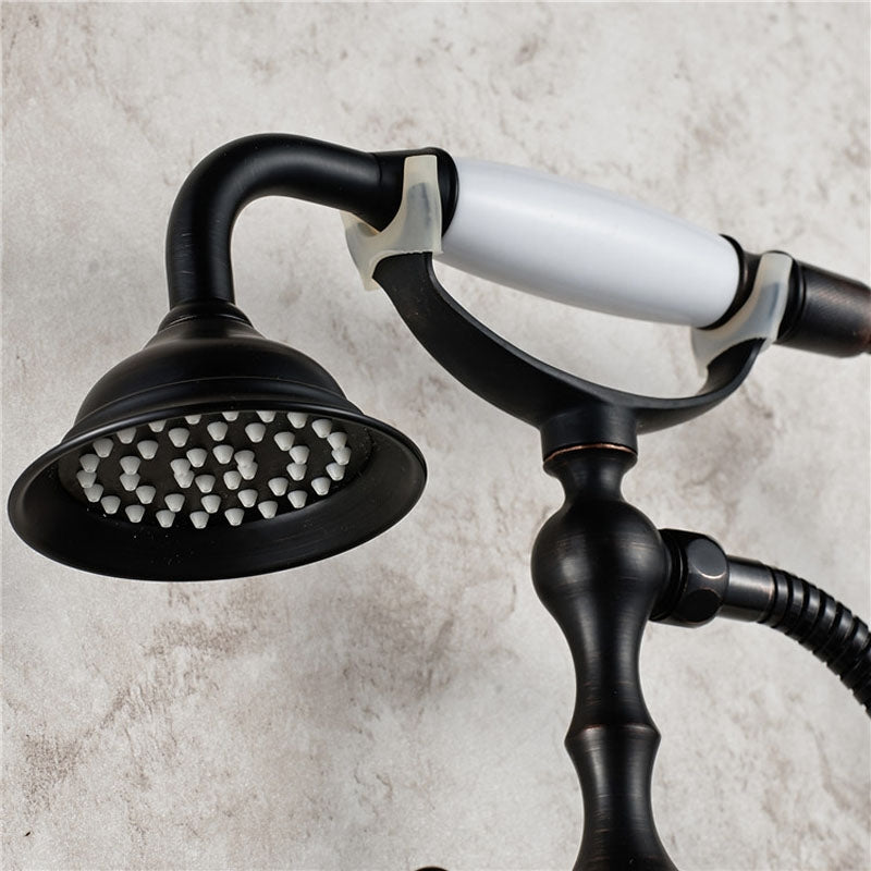 Juno Dark Oil Rubbed Bronze Wall Mount Claw Foot Tub Faucet