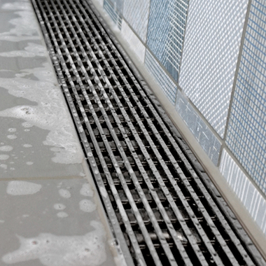 Juno Flange Body Linear Shower Drain Flag Design