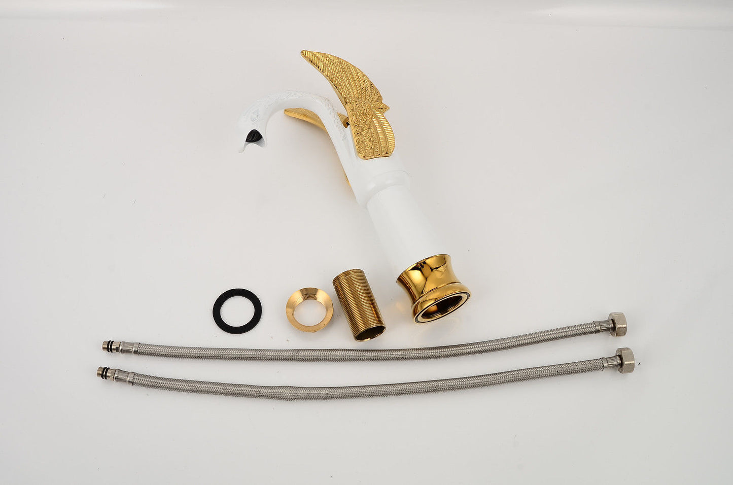 gold and white faucet accessories
