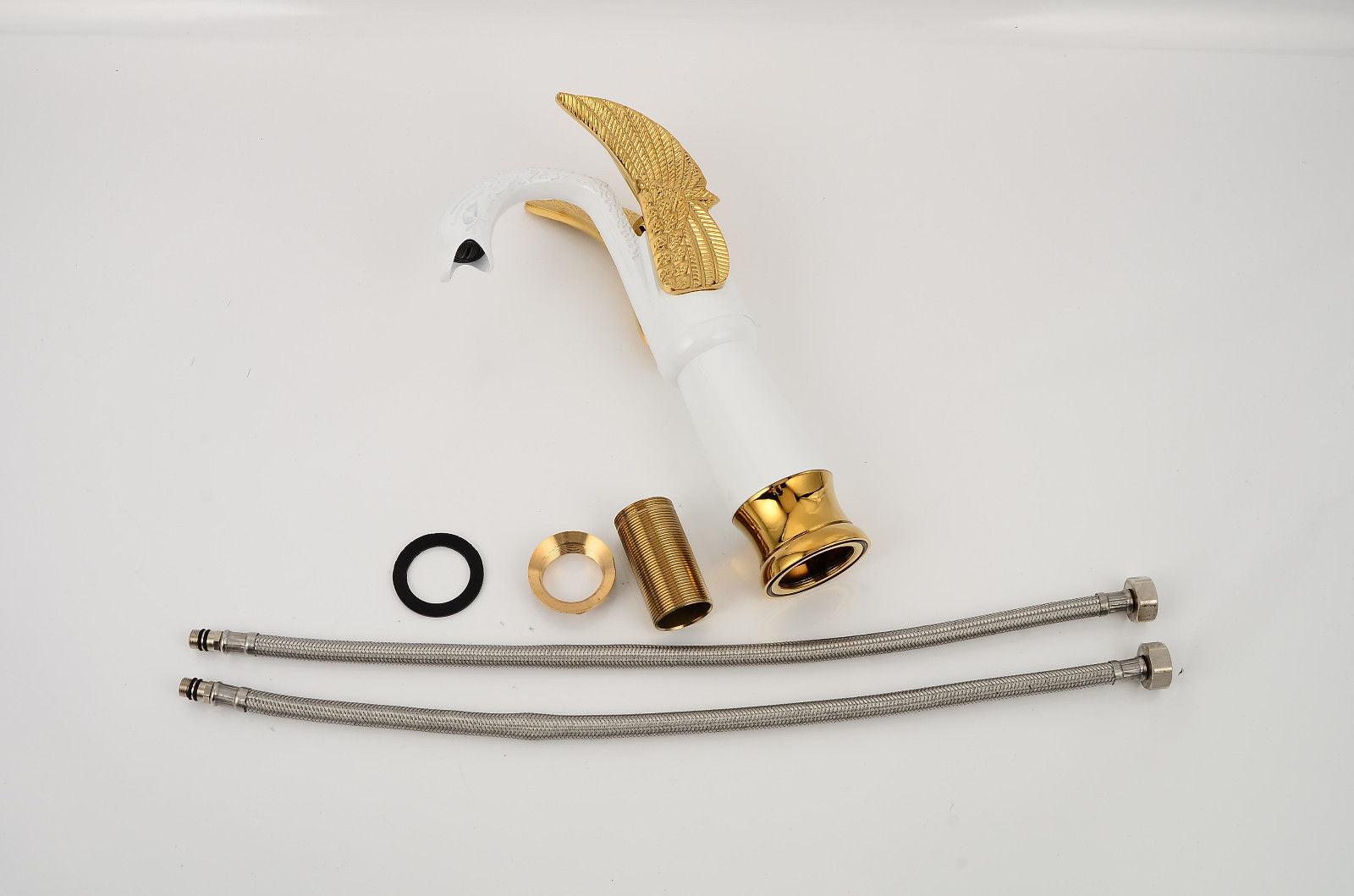gold and white faucet accessories