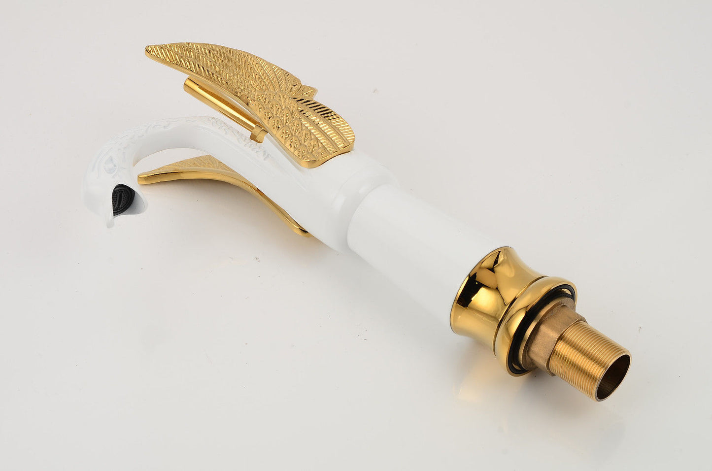 gold and white faucet