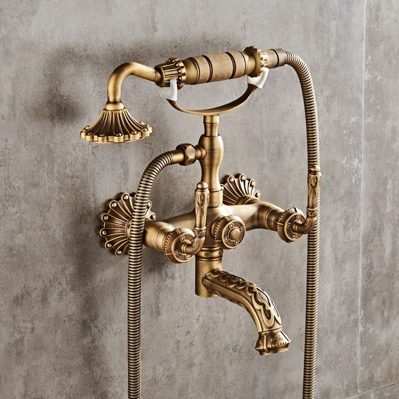 Juno Classic Antique Brass Wall Mount Bathroom Faucet with Hand